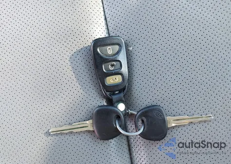 2009 Kia Optima Ex z USA, uszkodzony, nr VIN KNAGE228X95360436